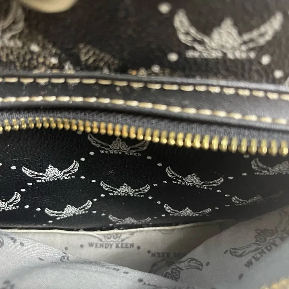 Wendy Keen Synthetic black and gray logo Backpack drawstring top closure.